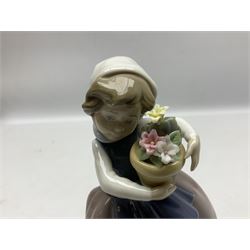 Three Lladro Flower Girls figures, comprising Sweet Scent no 5221, Pretty Pickings no 5222 and Spring is Here no 5223, largest example H18cm 