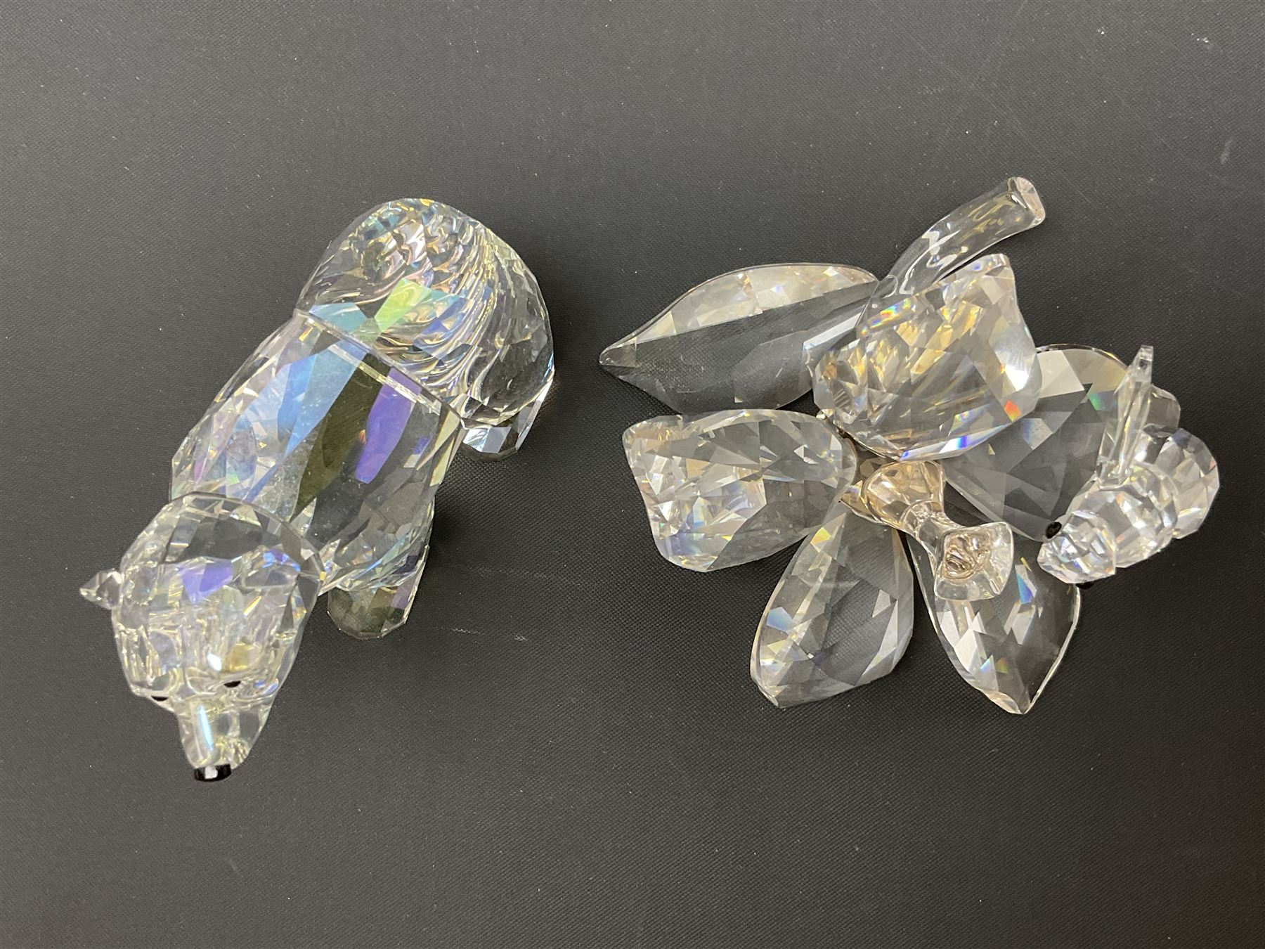 Twenty nine Swarovski Crystal animals, to include koala and baby, in frosted tree branch, elephants, polar bears, squirrel, monkeys, panda, unicorn and snails, etc 