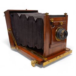 Victorian mahogany and brass bound cabinet card plate camera, with Ross (Zeiss Patent) lens, with three mahogany plate holders,  and an early 20th century oak tripod. This item has been registered for sale under Section 10 of the APHA Ivory Act