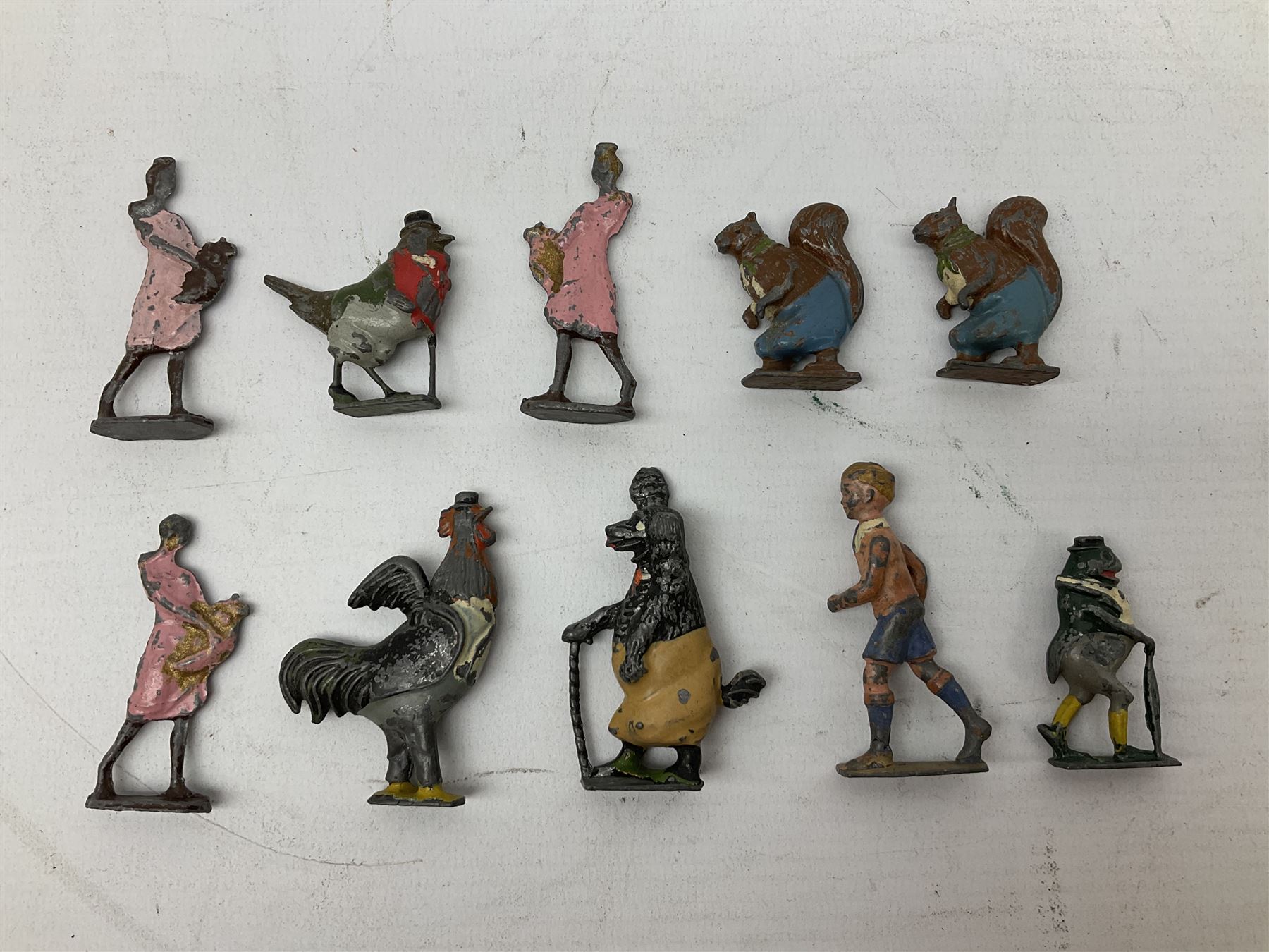 Collection of twenty-two Britains Cadbury's Cococubs play worn lead painted figures to include Mr Pie Porker, Mrs Pie Porker, Tiny Tusks, Captain Kangaroo, Granny Owl and others, Britains Snow White and Doc lead figures and other painted lead figures (30)