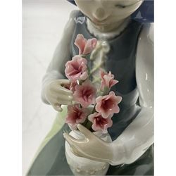 Three Lladro figures, comprising Garden Dance, no 6580, Flower Harmony, no 1418 and Precious Petals, all with original boxes, largest example H25cm