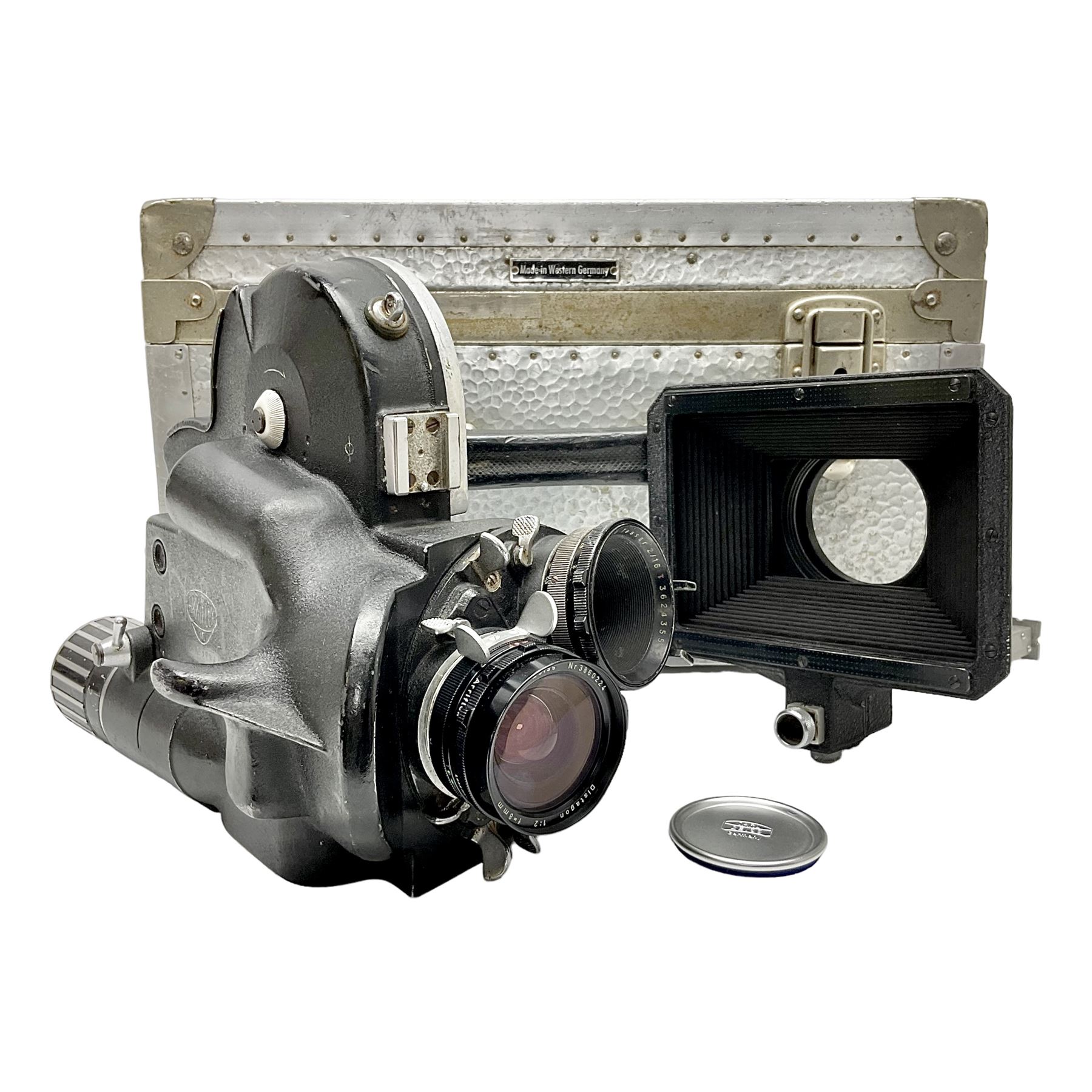 Arriflex 16SB camera body, serial no. 1784, with ' Carl Zeiss Distagon 1:2 f=8mm' lens, serial number 3860224, 'Carl Zeiss Jean Tessar 2/16' lens, serial no 3624355, camera pistol grip and other accessories, in fitted hard case