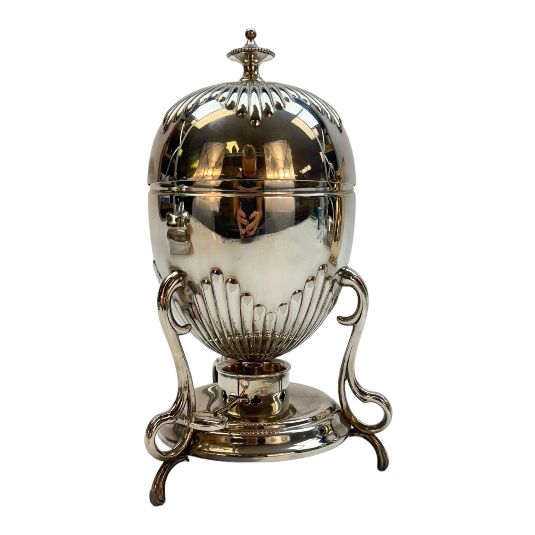 Modern silver plated Barker Ellis pitcher, with oblique gadrooned rim and acanthus capped C scroll handle, an egg coddler with part fluted body and urn finial and other silver plated items including toast rack, two serving dishes, etc, coddler H23.5cm