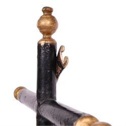 19th century black lacquered crucifix, with gilt detail upon a stepped base, H88cm   