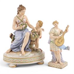 Karl Ens of Volkstedt figure group, modelled as a woman and cherub in a garden, with print...