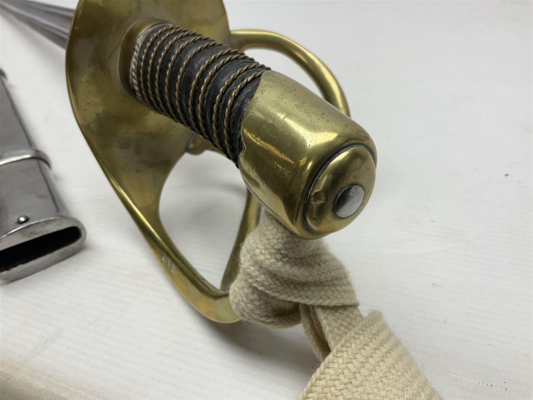 Early 19c French 1st Empire Heavy Cavalry trooper's sword, the 95.5cm double fullered blade with various stamped marks and inscribed Klingenthal 1814 to the back edge, four-bar brass hilt with wire-bound leather grip, knucklebow numbered 139; in polished steel scabbard with two suspension rings L117cm overall
