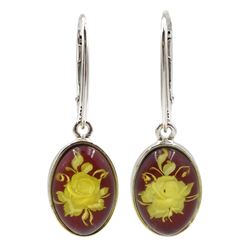 Pair of silver oval amber engraved rose pendant earrings, stamped 925 