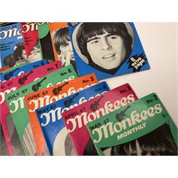 Monkees memorabilia - 'Monkees Monthly' magazine almost complete run from No.1 Feb 67 to No.31 Aug 69 (lacking nos.29 and 32); the cover of No.1 signed by all four members of the group during their 1997 Reunion Tour; quantity of A&BC bubble gum cards; programme for their only UK live performance in 1967 at Empire Pool Wembley; and other related late 1960s music magazines/paperback book