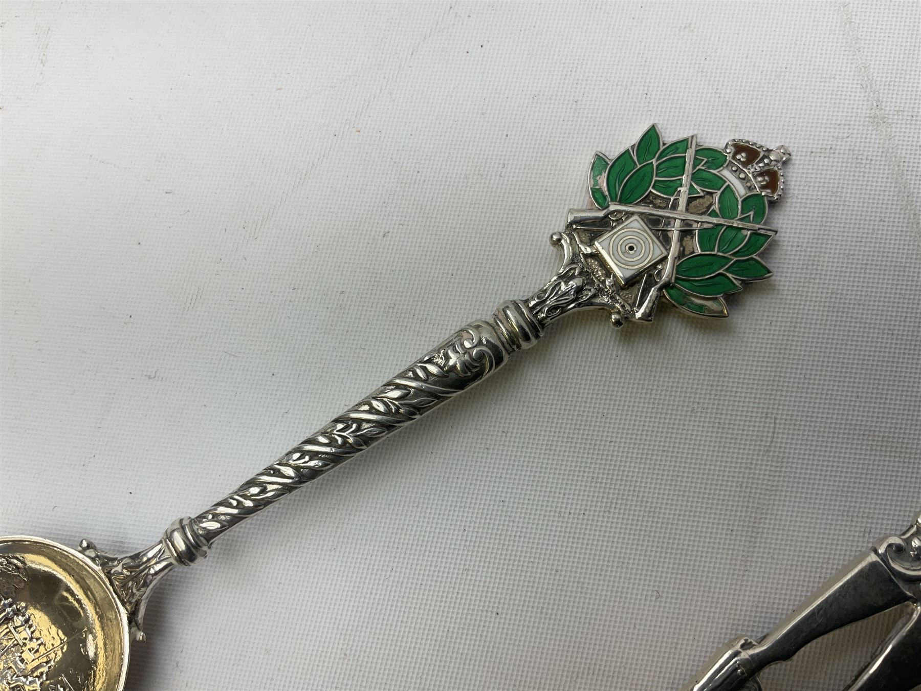 Three hallmarked silver shooting spoons including Royal Military College Rifle Club, Eastern Command S. of M. Hythe etc (3)