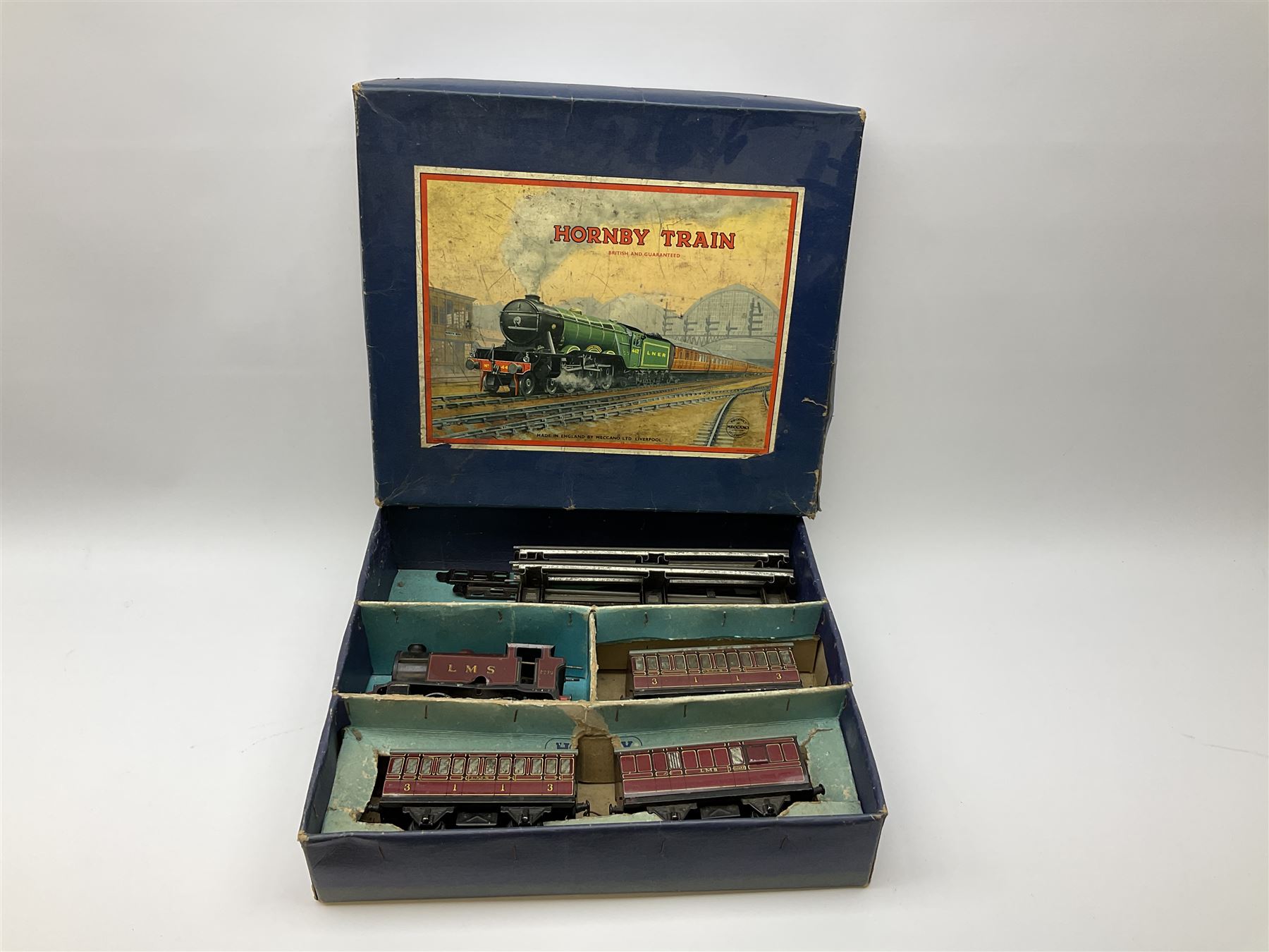 Hornby '0' gauge - Passenger Set No.21 with clockwork No.20 type 0-4-0 tender locomotive No.60985, two coaches and track, boxed; and Tank Passenger Set No.101 for spares or repair with clockwork No.101 type 0-4-0 tank locomotive No.2270, three coaches and track, boxed (2)