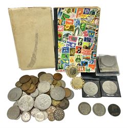 Two Great British King George V halfcrown coins dated 1922 and 1928, commemorative crowns, pre decimal coinage etc and a small number of stamps housed in two small stockbooks