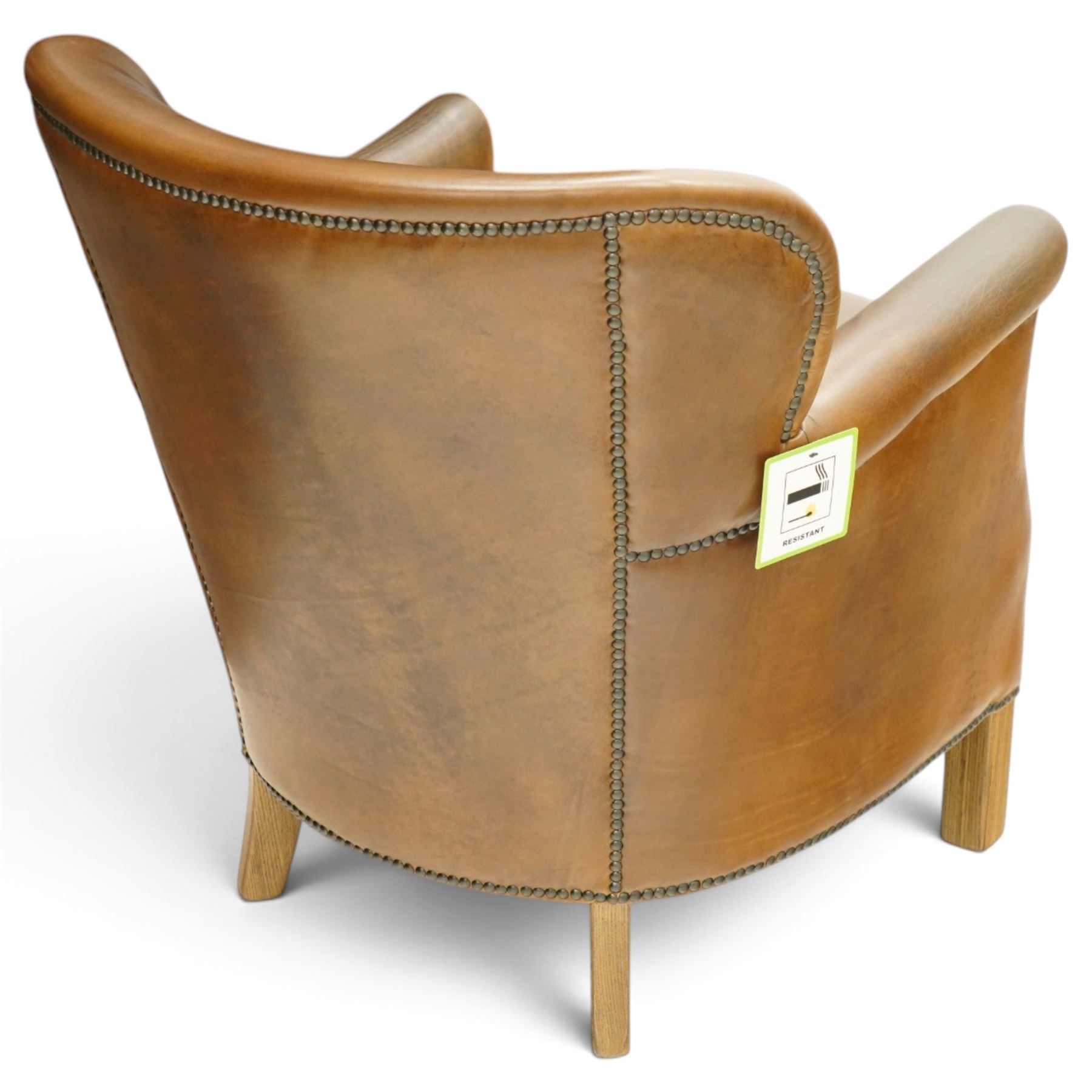 Halo - traditional tub design 'Cosy' club armchair, rolled arms with studwork terminals, upholstered in deep tan leather with loose seat cushion, on square supports