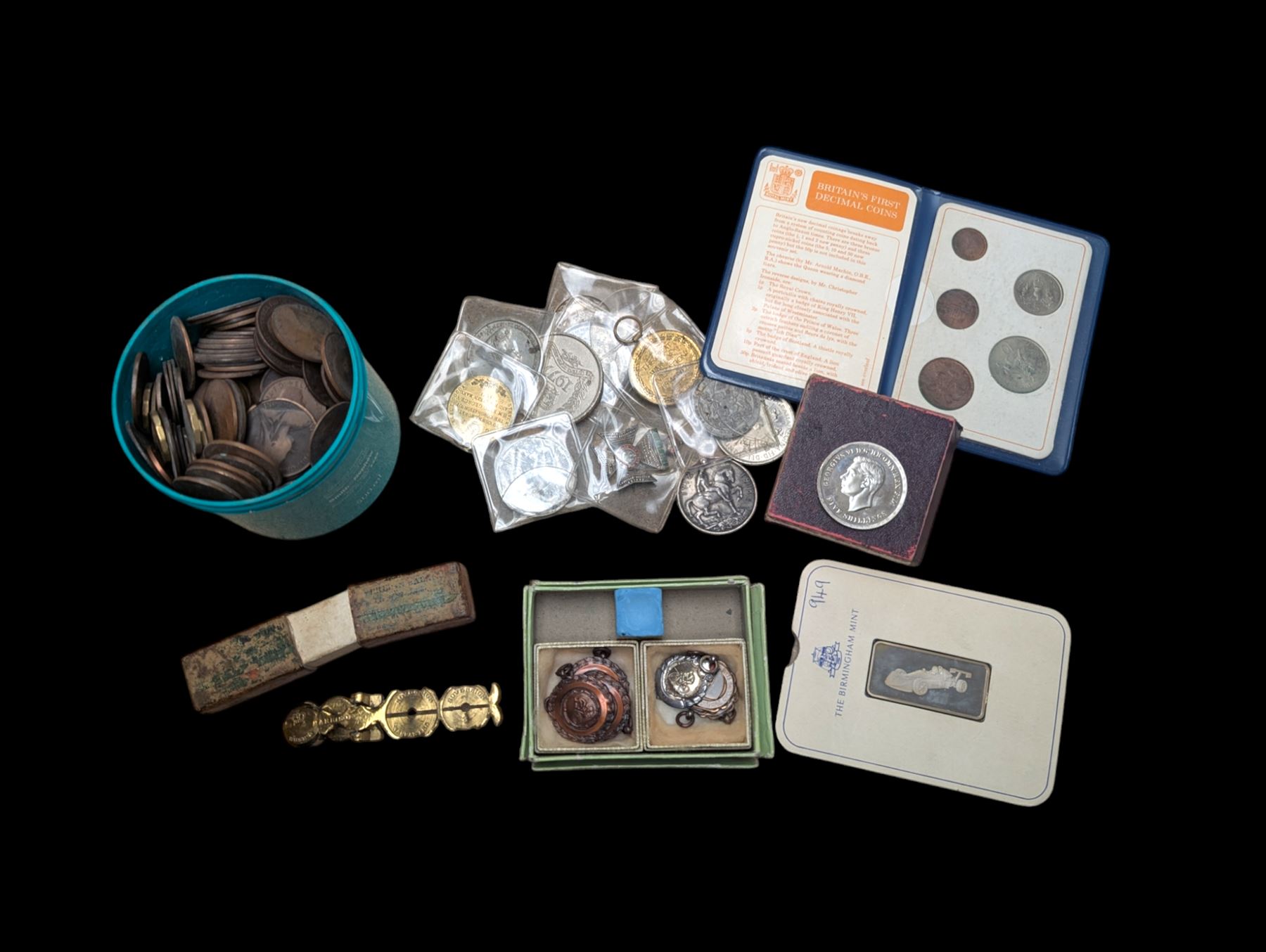 The Birmingham Mint International Formula 3 silver ingot, hallmarked, pair of sovereign scales, two silver fobs and others, etc and a collection of Great British coins