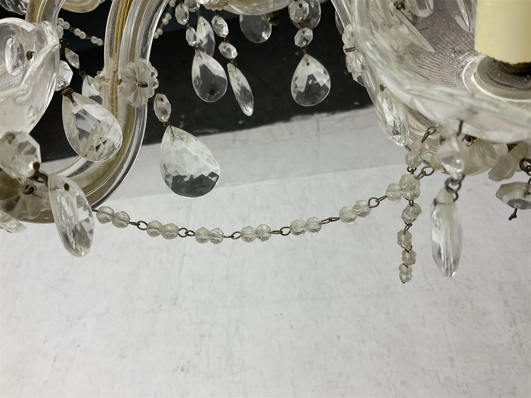 Victorian style glass eight branch chandelier, with drip trays, brass tone support, and drops