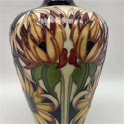 Moorcroft Sunflower vase, 2018 trial, of baluster form with fluted rim, tubelined and painted with sunflowers, on a cobalt blue ground, impressed and painted marks beneath, H23.5cm