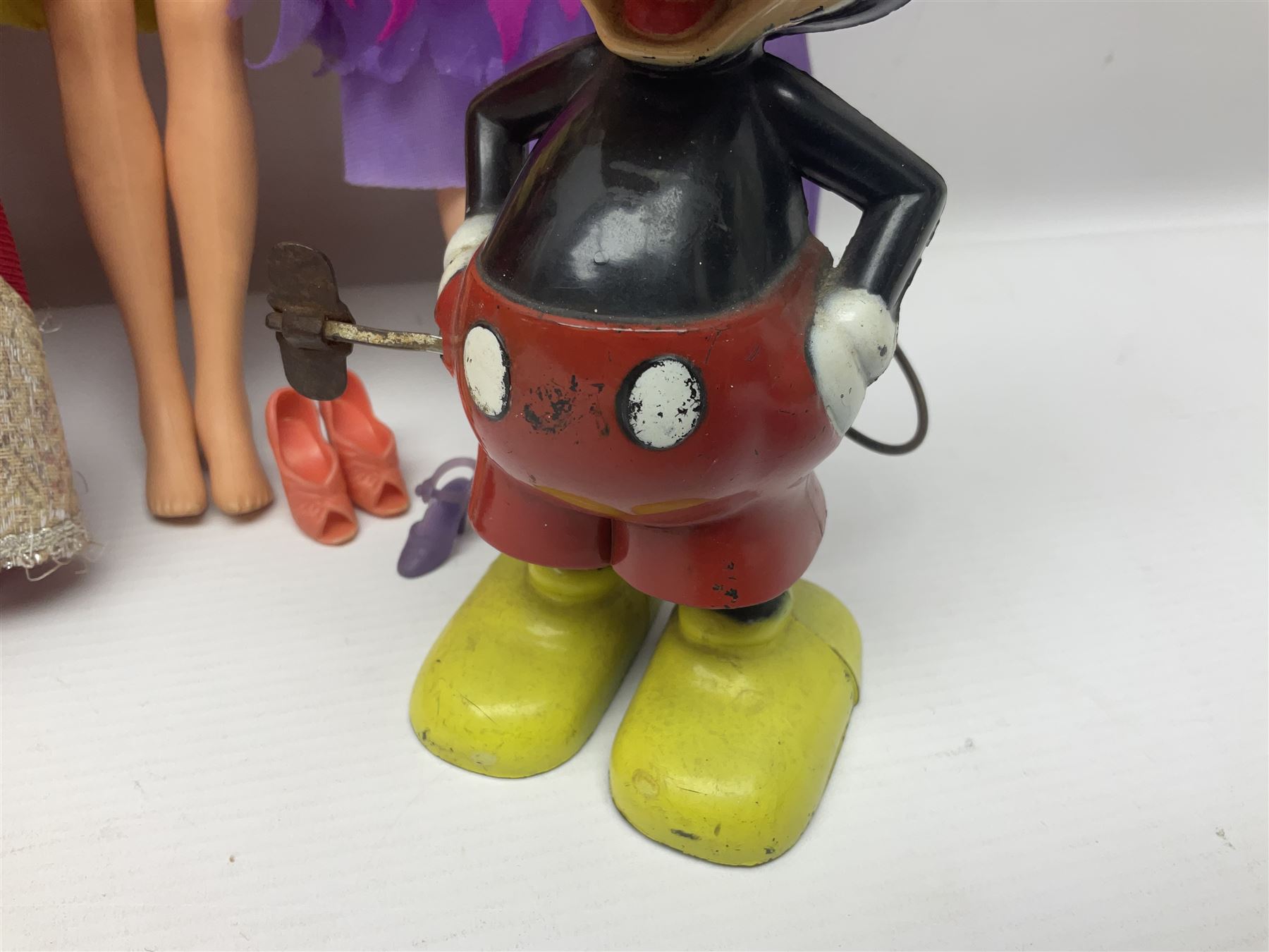 Pelham Puppet - Tyrolean Girl in yellow box; three 'A' Team action figures; clockwork plastic Mickey Mouse figure; and seven various fashion dolls (12)