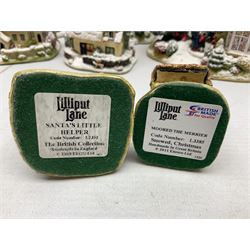 Five Lilliput Lane Illuminated Cottages, comprising Christmas is Coming, with box and deed, Christmas at Mol's, with box and deed, Christmas in Canterbury, with box and deed, Christmas Lights at Sweet Delights and The Three Kings, with box and deeds, together with twelve other Lilliput lanes, to include The First Noel, with box and deed, Winters Moonlight, Yuletide treats, with box and deed etc (17)