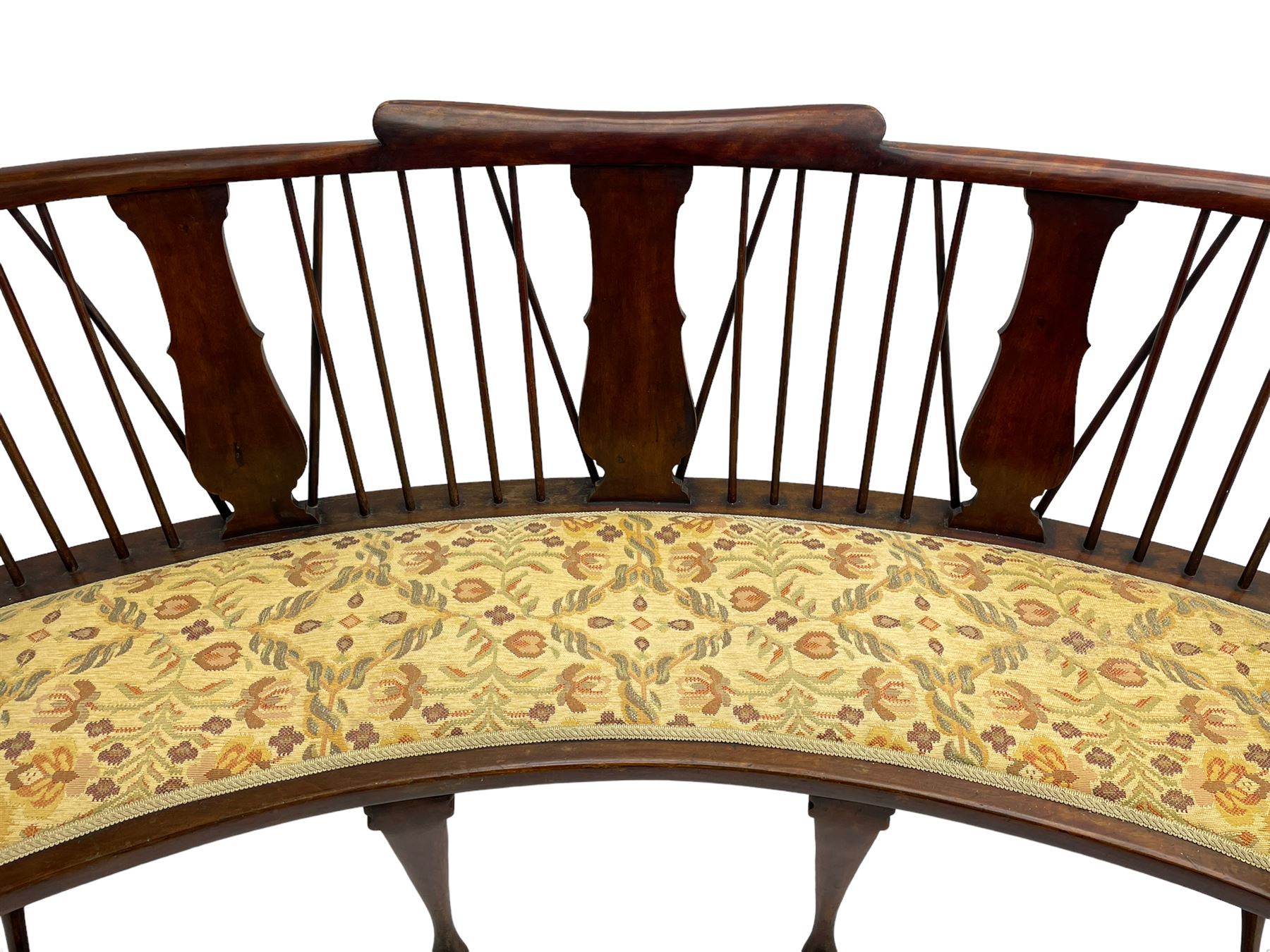Georgian design curved Windsor settee or settle, shaped cresting rail over triple vase shaped splats and stick back, upholstered seat, on cabriole front supports joined by a series of swell turned stretchers