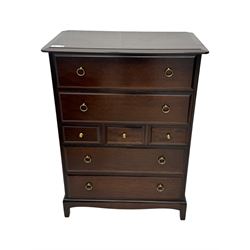 Stag Minstrel - mid-20th century chest, rectangular top over arrangement of three short and four long drawers, on bracket feet