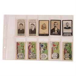 Forty Churchman's and Ogden's football cigarette cards, including twenty-two Association Footballers' and seven 'Football Club Colours' examples