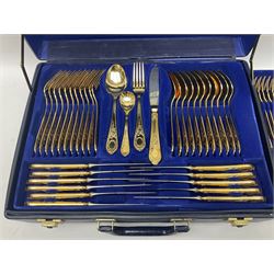 Bestecke Solingen canteen of gold plated cutlery for twelve place settings, including ladle, cake slice, fish servers, fish knives and forks, 108 pieces total, contained within a briefcase 