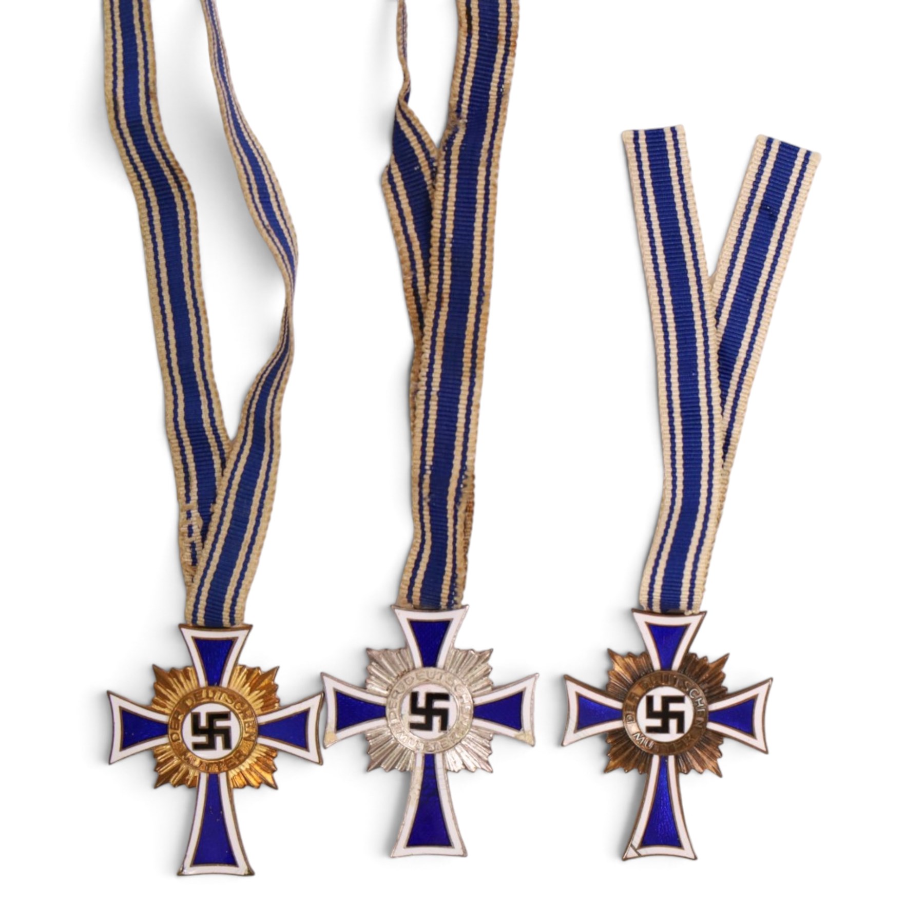 WWII German Third Reich three Mothers Cross, in gold, silver and bronze 