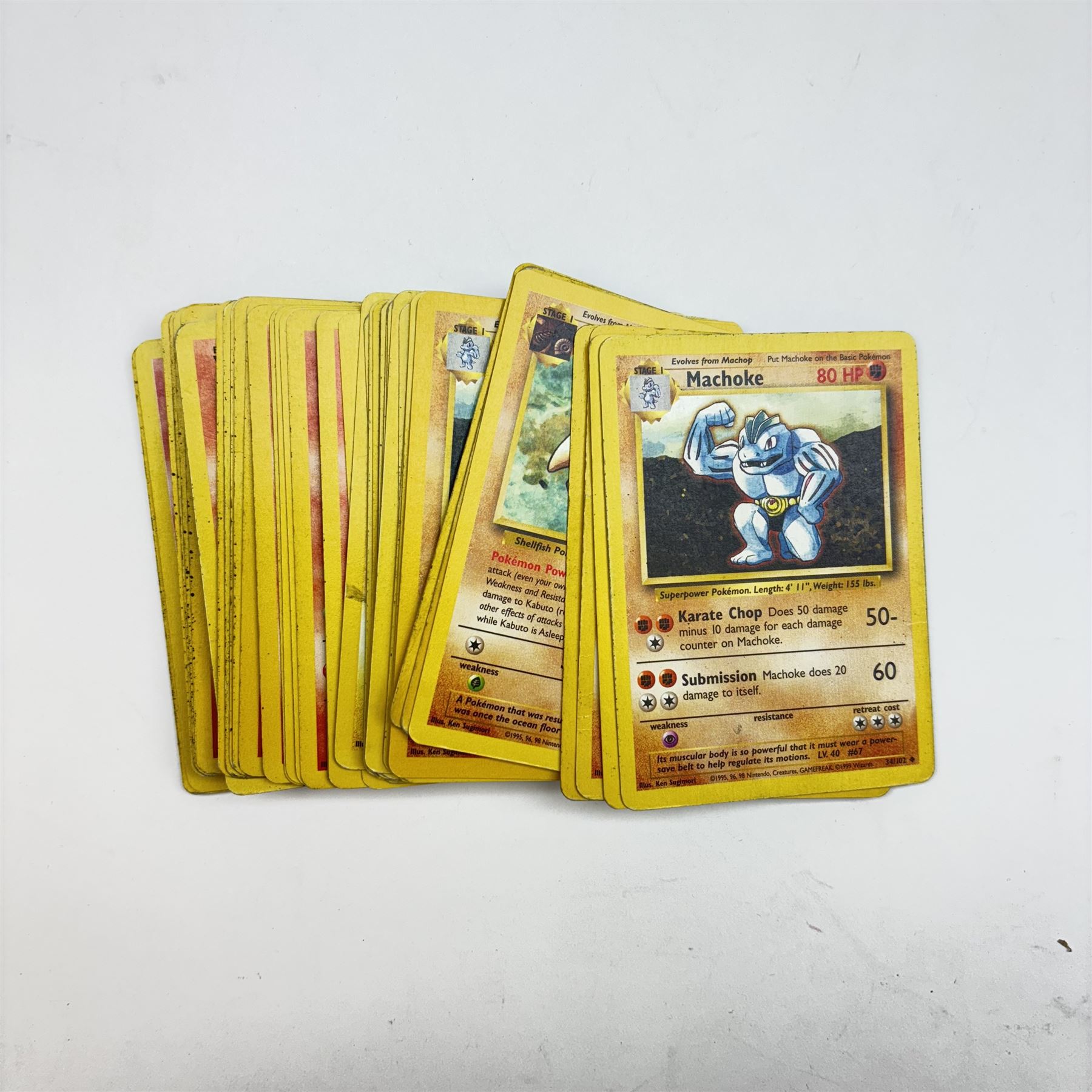 Collection of approximately five hundred vintage Pokemon TCG trading cards, mostly 1999 Wizards examples, including Jungle, Fossil, Team Rocket and Base Set, energy and trainer cards, together with Pokemon collectables including Zapdos 145 Collector Marble Case with eight marbles, Pokemon Gold Version Gameboy game, empty card boxes and Digimon cards