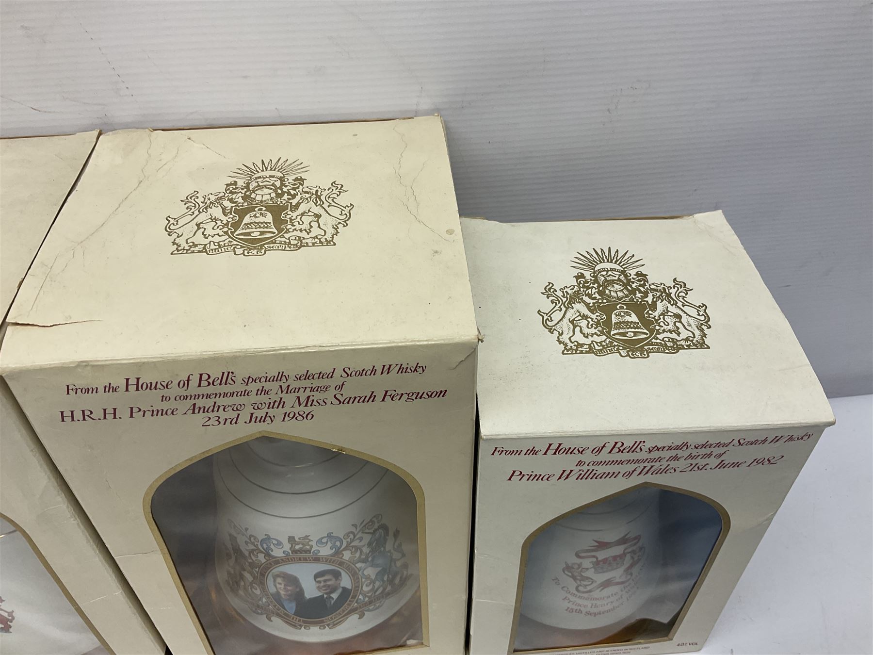 Bells, Scotch whisky, in eight Wade ceramic decanters, including Christmas 1992, Queens 60th birthday, Birth of Prince William etc, various contents and proof   