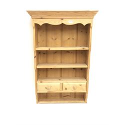 Narrow pine wall rack, three shelves above two drawers