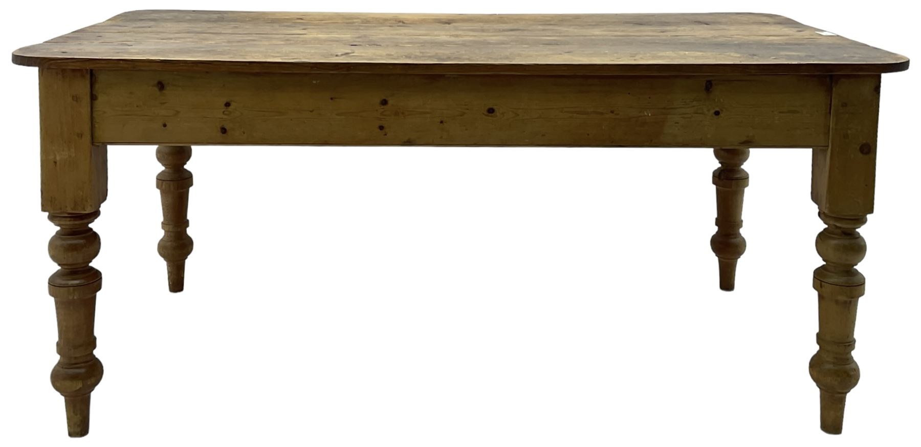 Victorian pine farmhouse dining table, rectangular plank top with rounded corners, on turned supports 