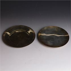 Two silver-gilt patens, comprising French silver example, of typical flatted circular form, engraved IHS to underside, with Minerva's head mark to one side and a 1960s example of similar form engraved IHS to underside, hallmarked Pepper & Hope Ltd, Birmingham 1967, largest D12.5cm