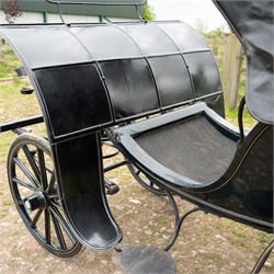 George IV Phaeton Carriage by Mills, Paddington, London

A George IV four wheeled phaeton carriage by Mills, Paddington, London, the hubs stamped accordingly, with black painted bodywork, folding black leather hood, upholstered passenger compartment and rear luggage platform. The carriage is fitted with wooden spoked wheels, yellow coachlining, leaf spring suspension, front mudguards, metal footrests and shafts for single horse use. In original condition by one of the best carriage builders of the day

Features

• Maker’s hubs marked Mills, Paddington, London
• Four wheeled phaeton carriage
• Black painted bodywork with fine yellow coachlining
• Folding black leather hood
• Button upholstered passenger seating
• Rear luggage platform with rail
• Wooden spoked wheels with rubber tyres
• Leaf spring suspension
• Shafts for single horse use
• Front mudguards and metal footrests
• Fitted with a side mounted ratchet hand brake operating on the rear wheel


Dimensions:
Overall length: 305 cm
Width: 160 cm
Height: 213 cm

Wheel Diameters:
Front wheels: 77 cm
Rear wheels: 107 cm

Seating:
Driving seats: 1
Passenger seats: 2