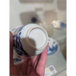 Pair of Chinese blue and white tea bowls, one with cover and four saucers, depicting two figures on a boat at sea, tea bowl H7cm