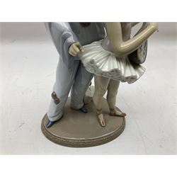 Lladro figure, Minstrel's Love, modelled as a couple entertaining, the lady in ballerina costume playing the lute and the gent stood behind her in jester type dress, sculpted by Rafael Lozano, with original box, no 5821, year issued 1991, year retired 1993, H31cm