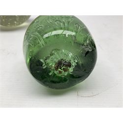 Four Victorian and later green glass dump paperweights with with air bubble inclusions, largest example H17cm