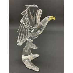 Swarovski Crystal animals, comprising white peacock, the tail with cascading blue flowers, perched eagle with yellow beak, ibex with frosted crystal horns and unicorn with frosted crystal horn, tallest H13cm