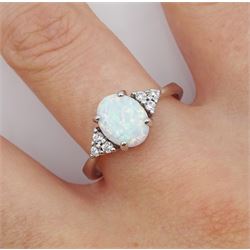 Silver single stone opal and cubic zirconia cluster ring, stamped 925 