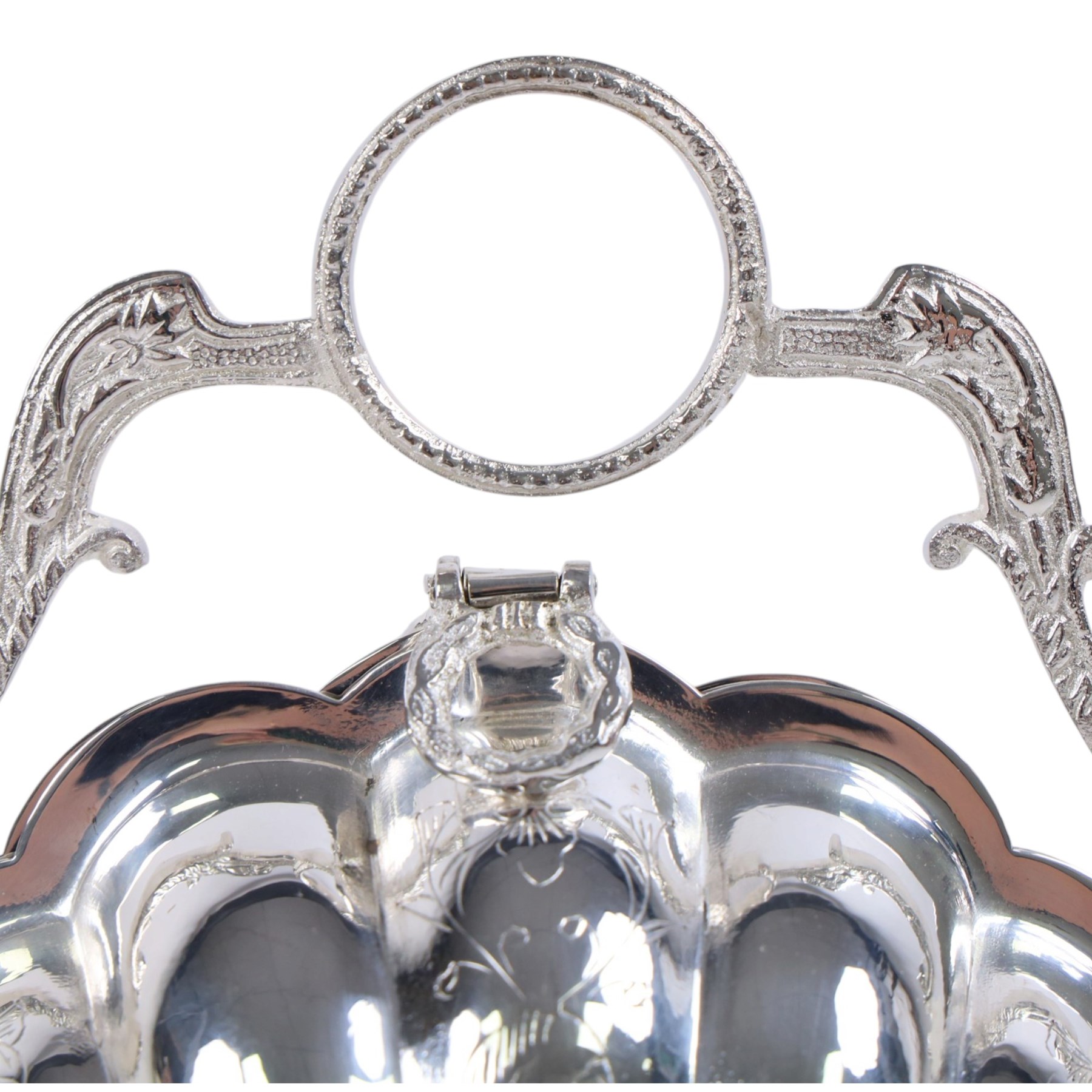 Silver-plated Victorian style biscuit box, in a shell form with engraved leaf detailing, upon scroll feet, H24cm