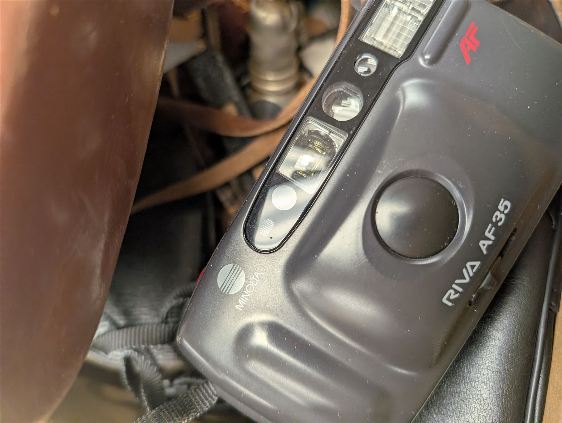 Yashica Pentamatic camera body with Yashinon 1:1.8 f=5.5 lens, Afga Isolette II, Minolta Riva AF35, Kodak Brownie cameras and accessories