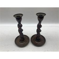 Three pairs of Victorian and later brass candlesticks, to include a pair with barley twist stems, H29.5cm, together with a pair of oak barley twist examples