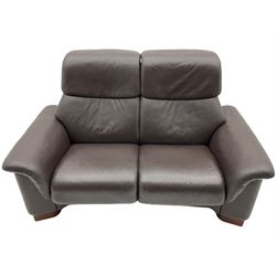 Ekornes Stressless - two seat reclining sofa, adjustable headrests, upholstered in cocoa brown leather