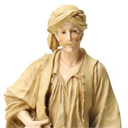 Pair of Ernst Wahliss for Turn Wien porcelain figures of Middle Eastern water carriers, taller figure H35cm