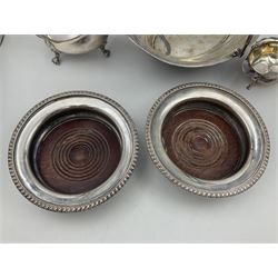 Silver plated seven bar toast rack by Mappin & Webb, together with other silver plated items including pair of bottle coasters, swing handled baskets and two sauce boats