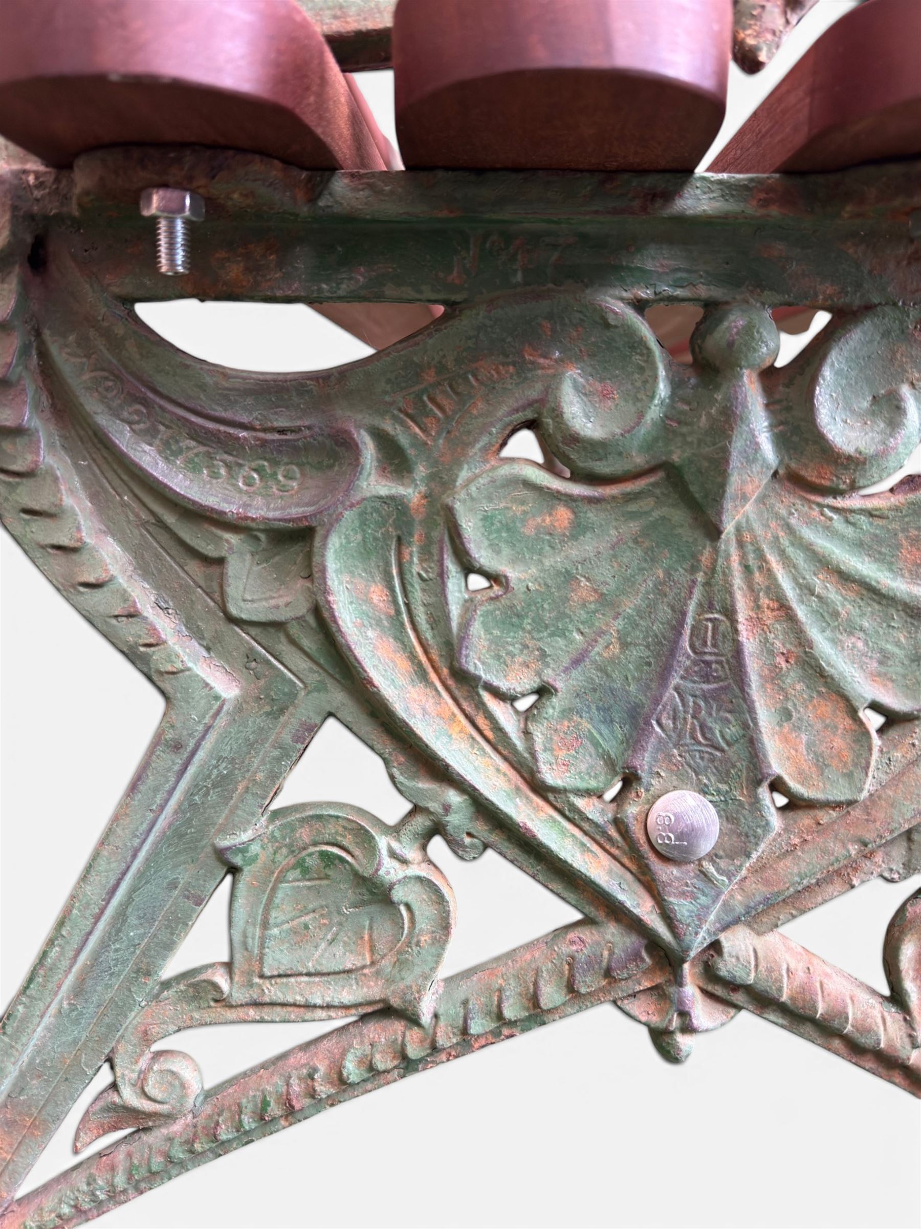 Coalbrookdale - Lily Pad design cast iron an wood slatted garden bench, late 19th century Aesthetic Movement, no. 217569, distressed green paint, iron centre support and seat stretcher, hardwood slatted