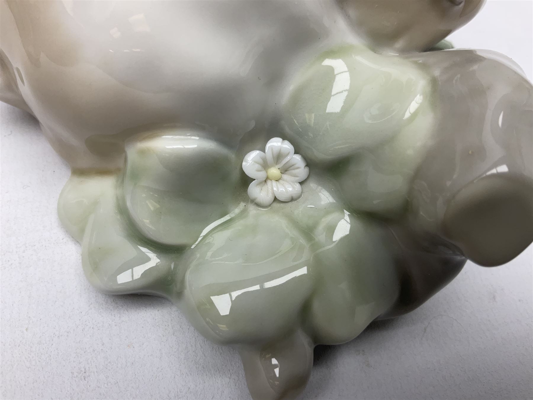 Six Lladro figures, comprising Naughty Dog no 4982, Best Friend 7620 and My Buddy no 7609, Kitty Confrontation no 1442, It Wasn't Me no 7672 and Rabbit Eating no 4772, three with original boxes, largest example H22cm