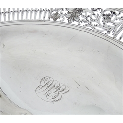 George III silver swing handled pedestal fruit basket,  pierced and engraved decoration by William Allen III, London 1802, approx 28.5oz, length 37cm