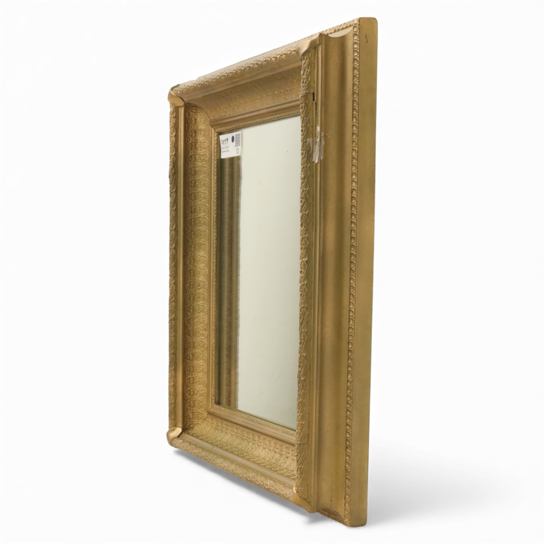 Two late 20th century gilt mirrors, foliate and dart detailing to the frame (H 92cm, W 66cm; H 53cm W 45cm)