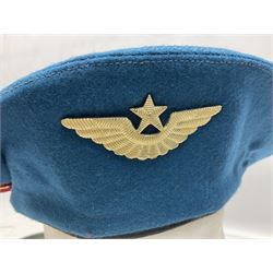 Four paratrooper berets - Russian, Italian, British and Foreign Legion; all with badges (4)