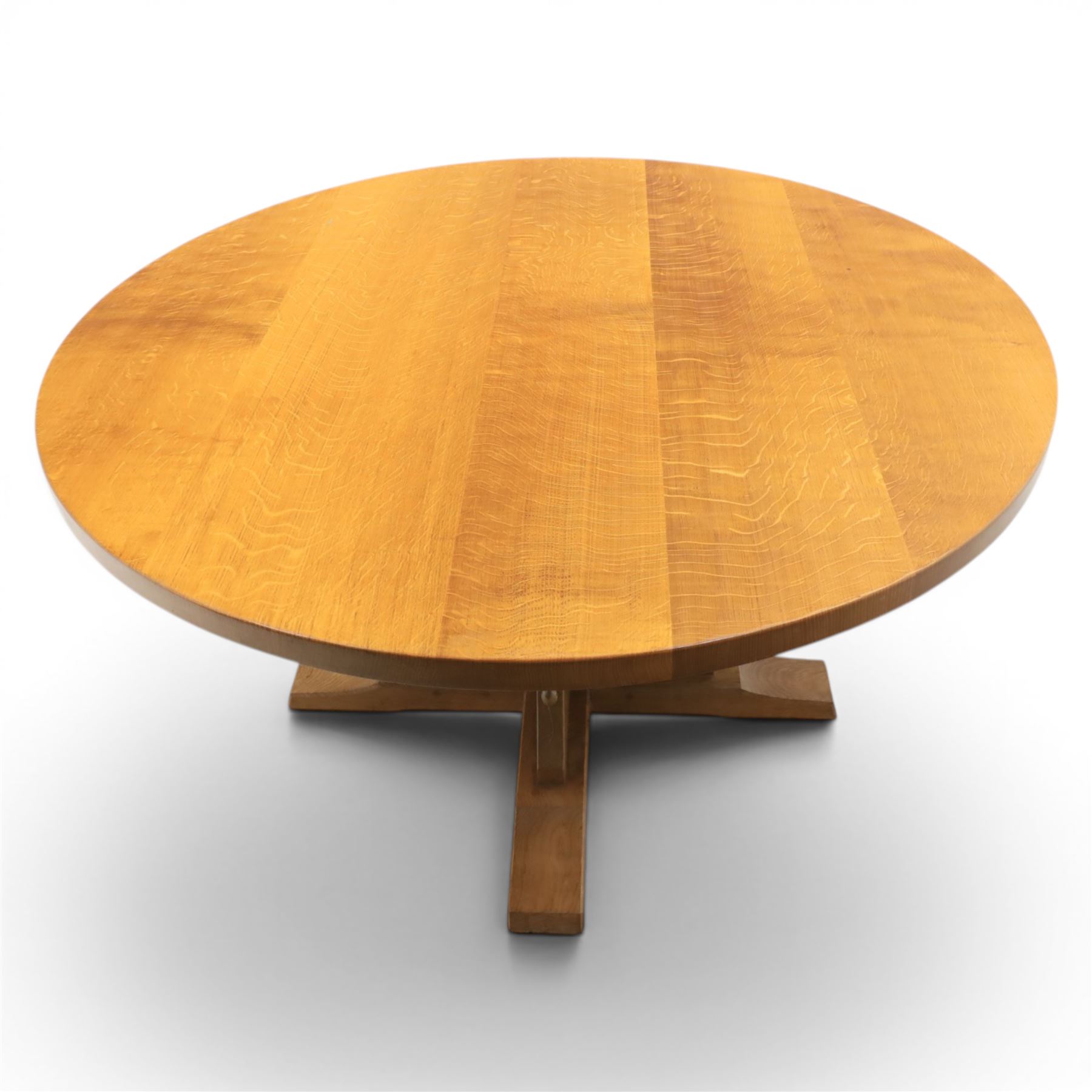 Mouseman - circular adzed oak circular dining table, on quatriform base with carved mouse signature, by the workshop of Robert Thompson of Kilburn