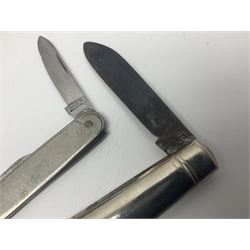 Seven pen knives, two lighters, including one Ronson example and a collection of postcards